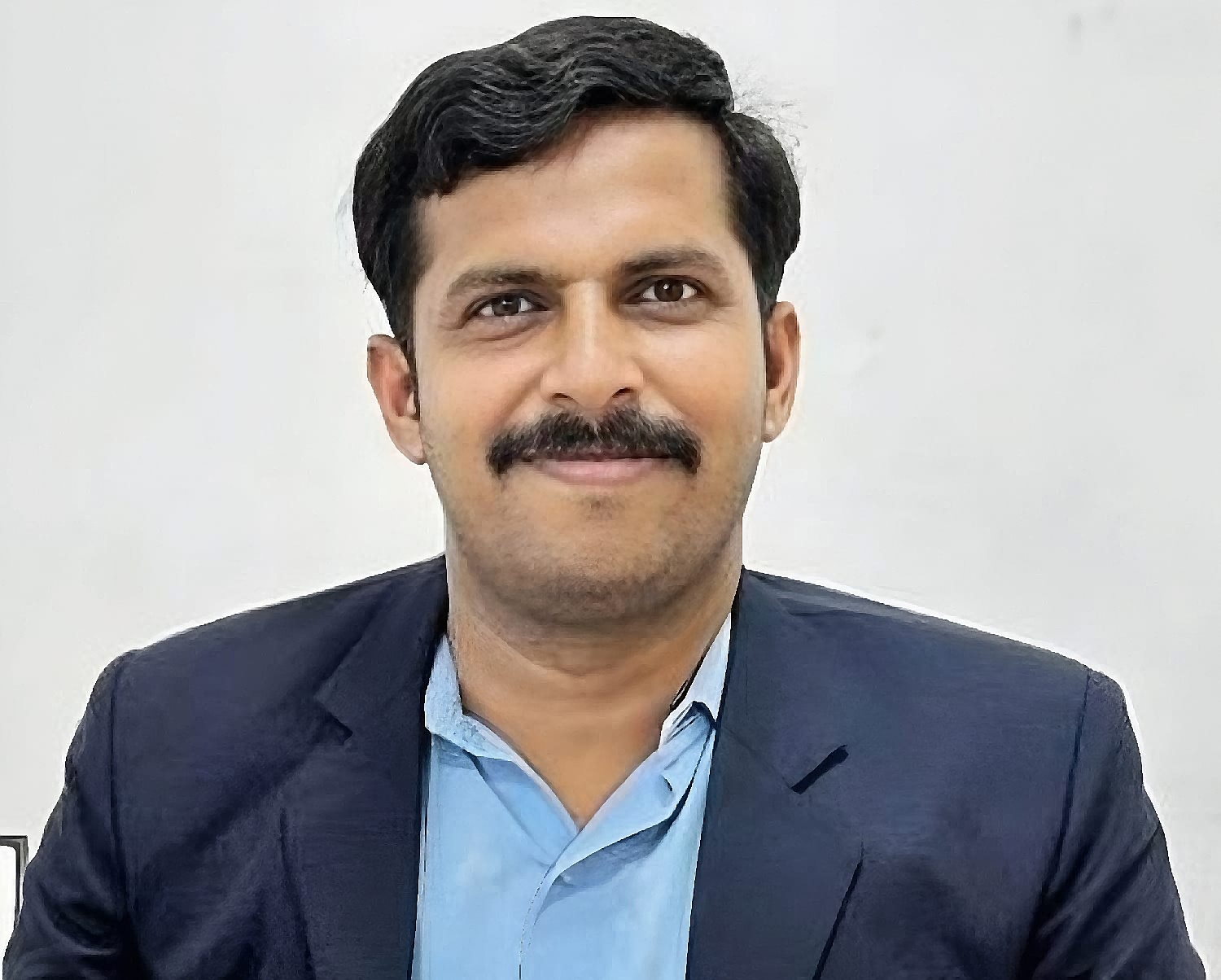 Dr. M. Raju
